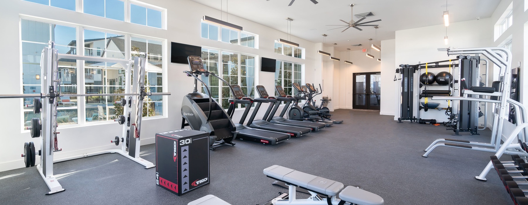 fitness center with cardio machines